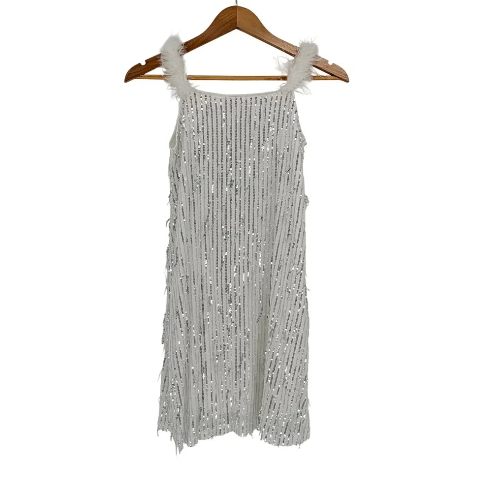 EXARUS Girls White Silver Sequin‎ Fringe Dress Feather Straps Size 14Y Hair Bow